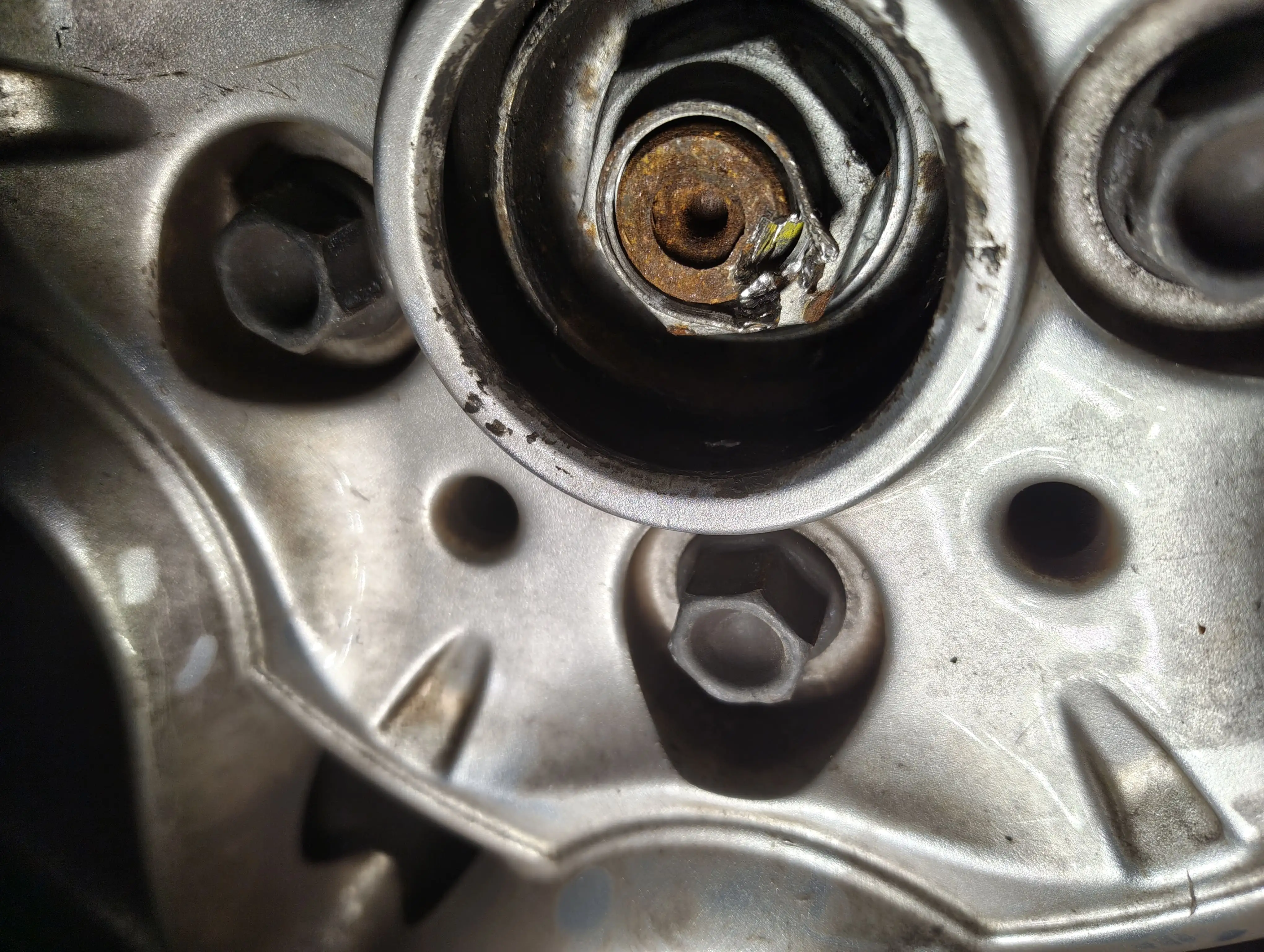 After hammering the driveshaft nut indentation with a hammer and flathead screwdriver