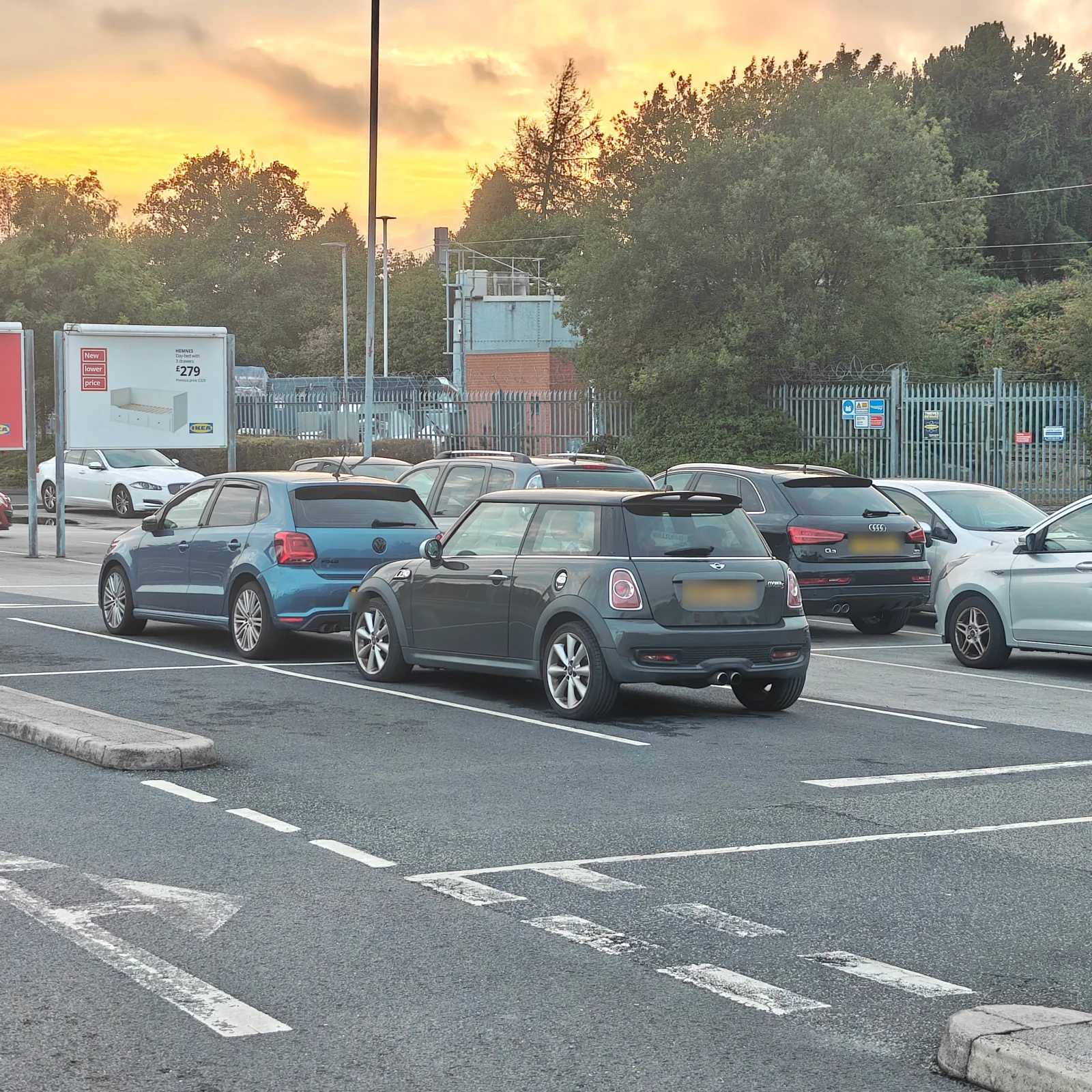 Grey MINI R56 Cooper S in a car park at sunset