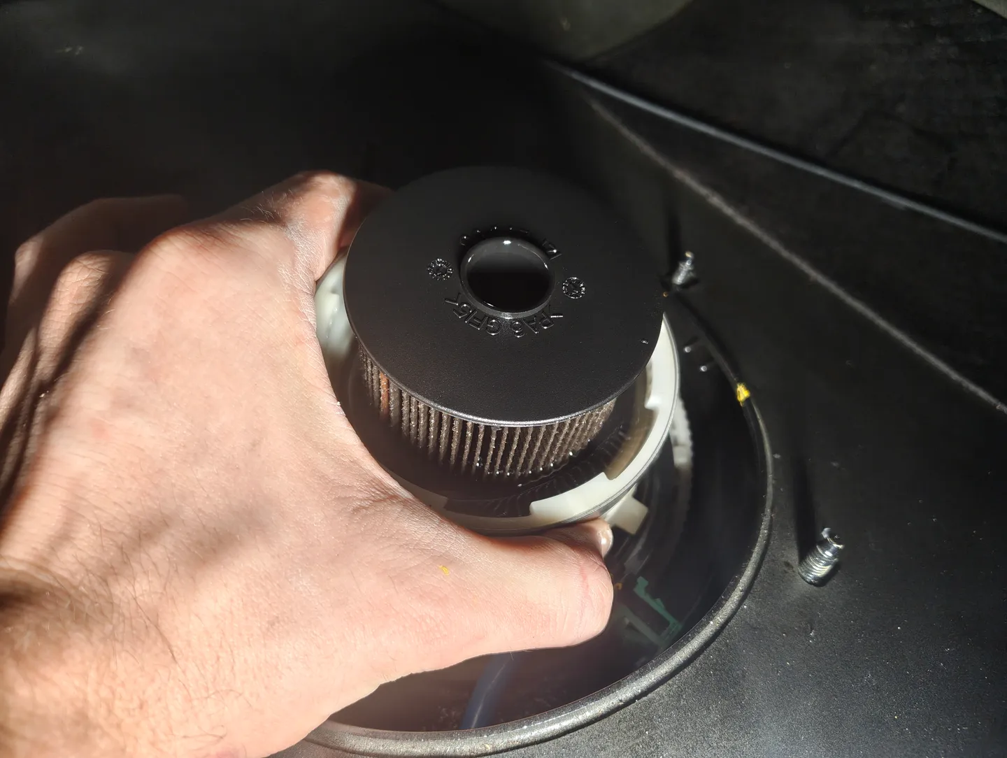 Holding fuel filter housing