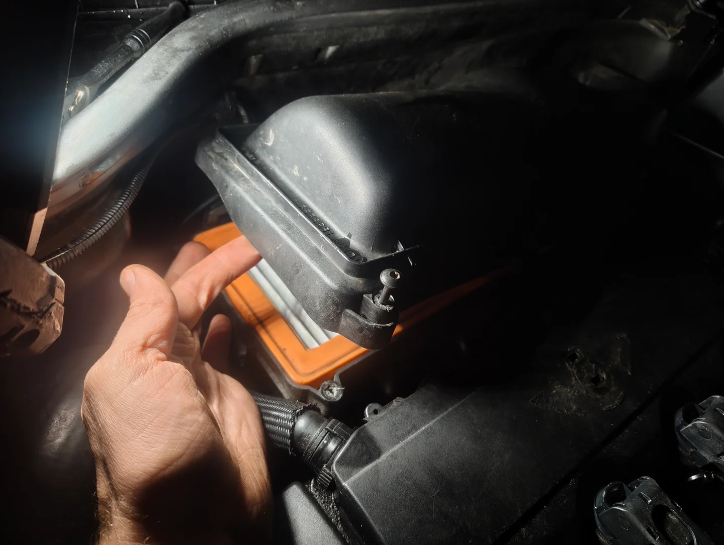 Lifted air filter housing cover