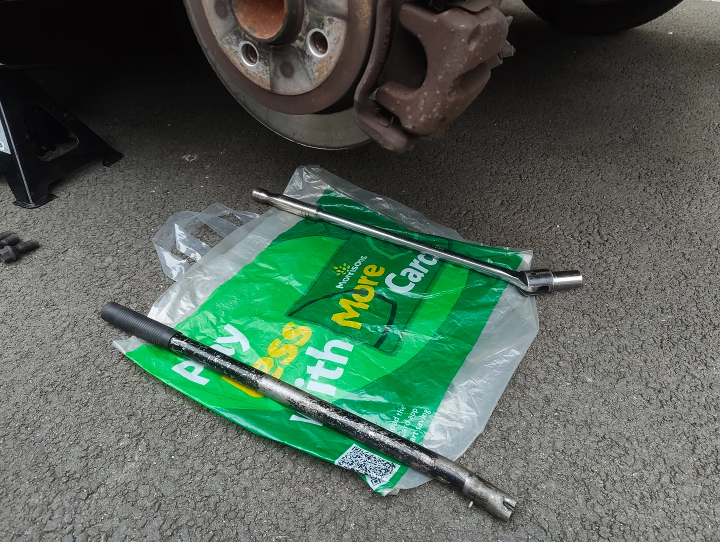 Morrisons bag under nearside rear disc
