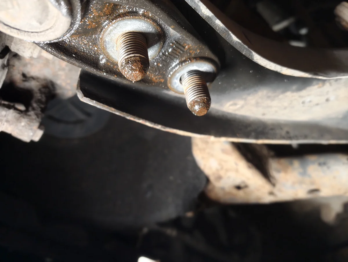 Nuts removed from the front passenger-side lower ball joint