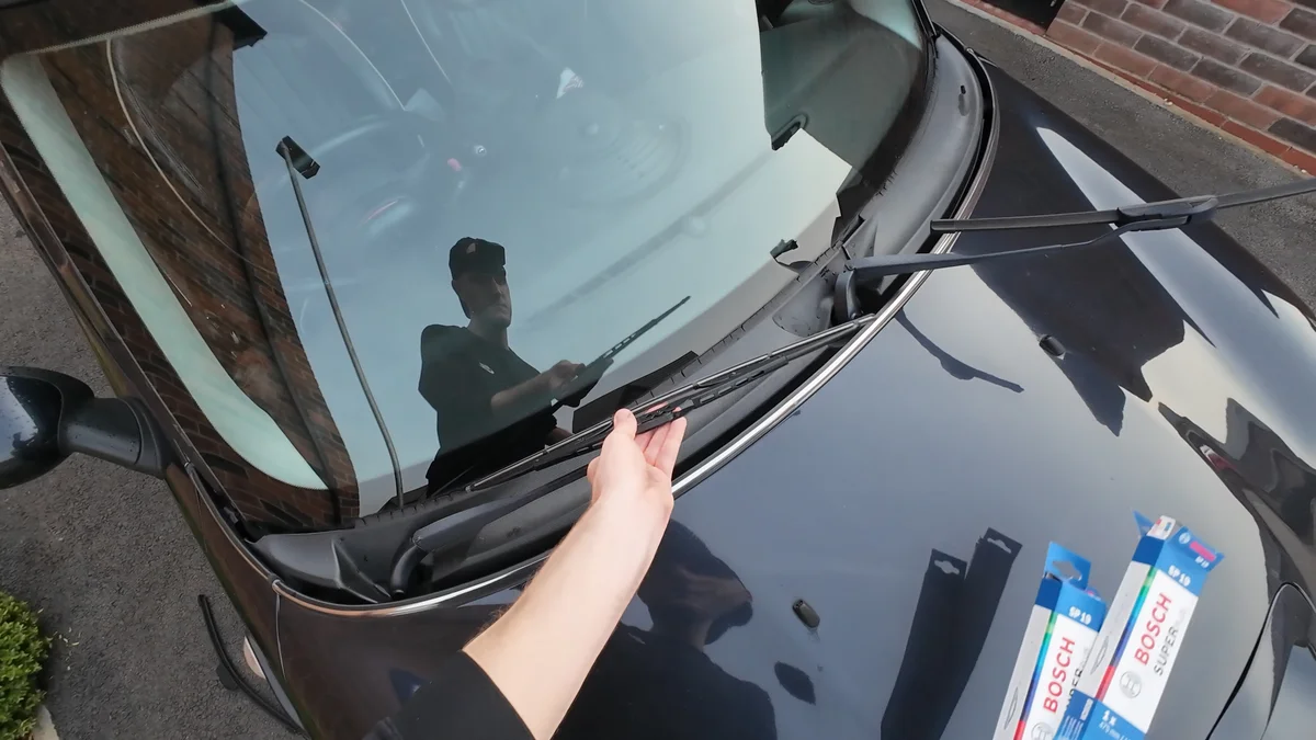 Placing nineteen inch bosch wiper blade back on windscreen