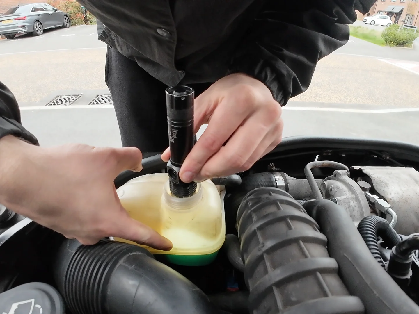 Pionitng at the seam on the coolant reservoir