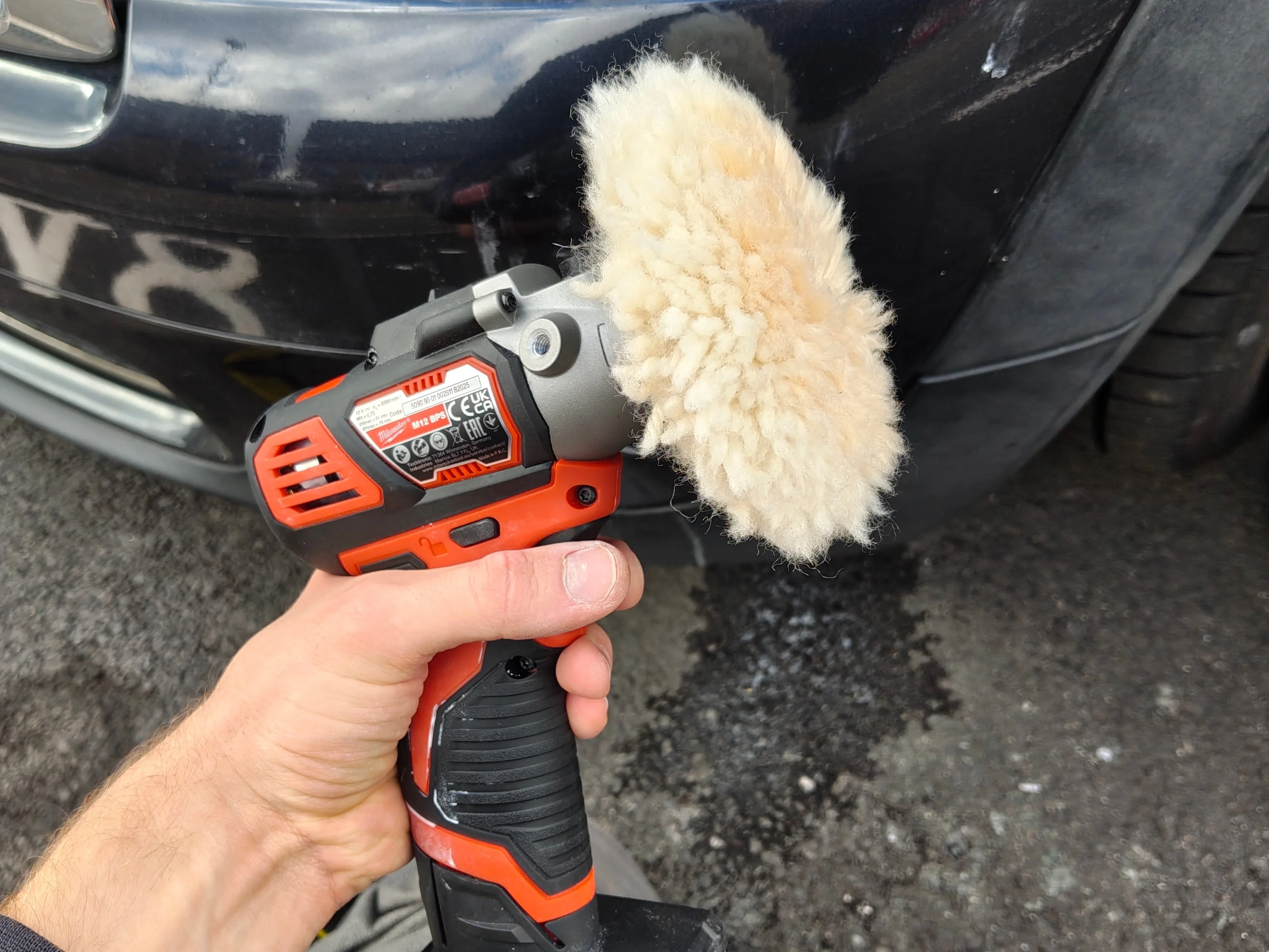 Polisher with wool pad attached