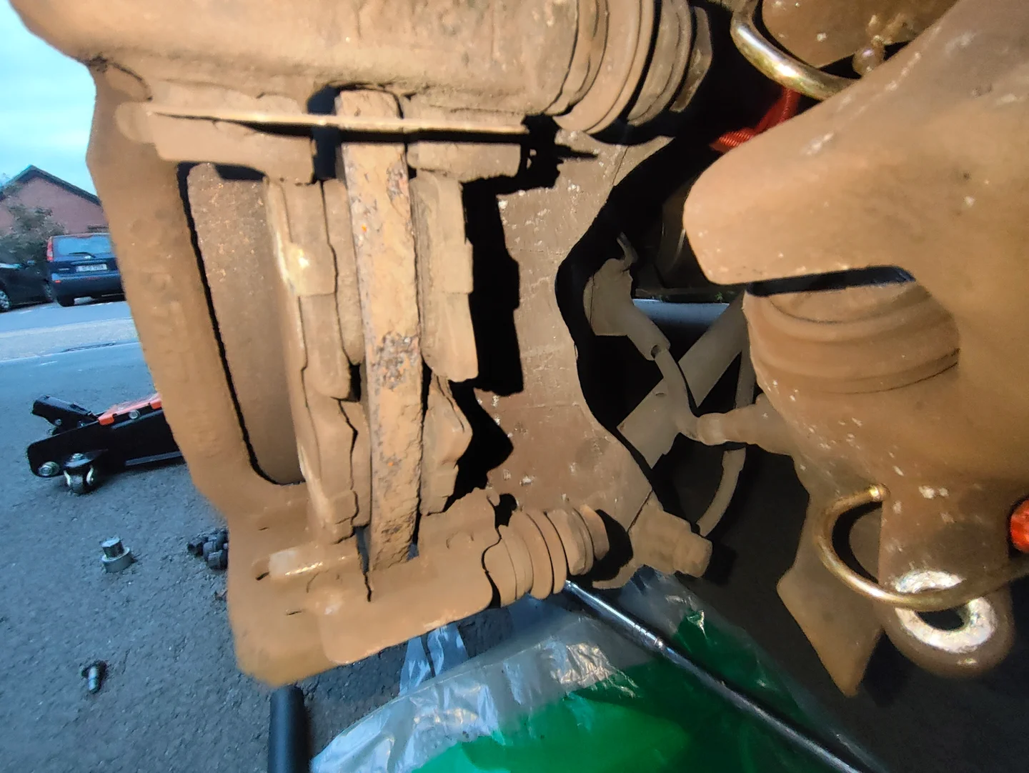 Rear brake caliper removed