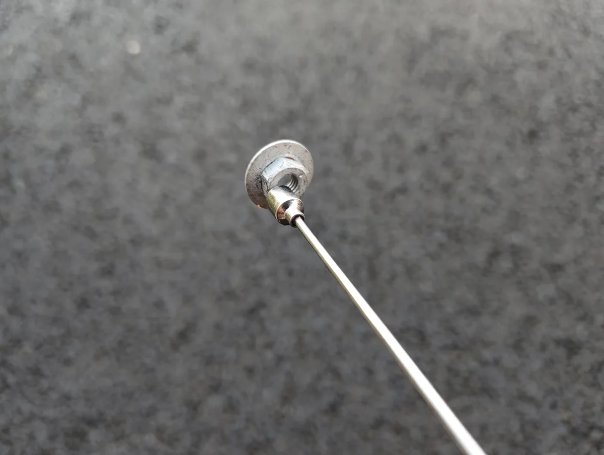 Telescopic magnet tool with nut attached