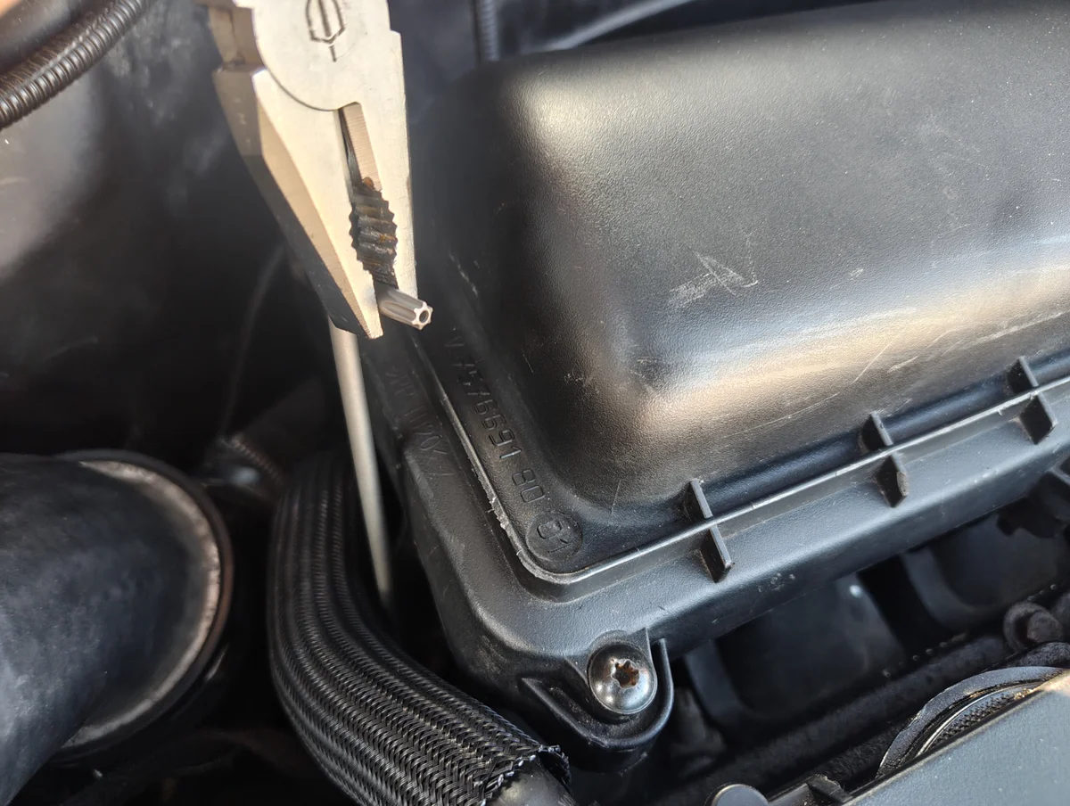 Torx 25 key being turned with pliers