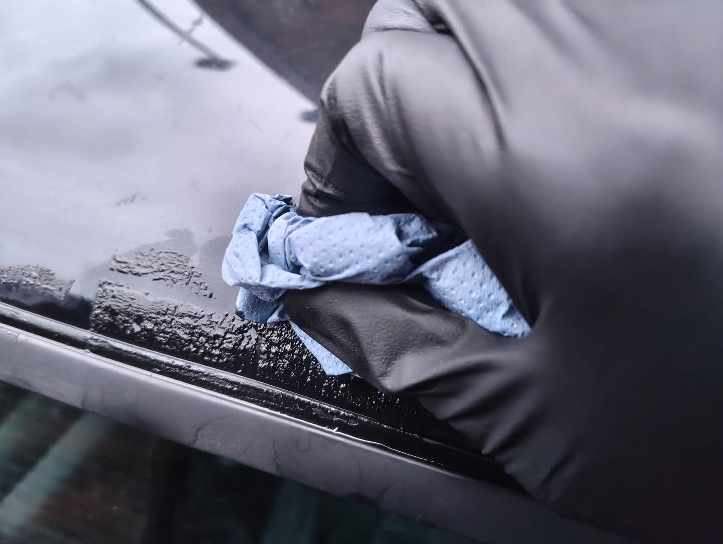 Wiping adhesive with paper towel