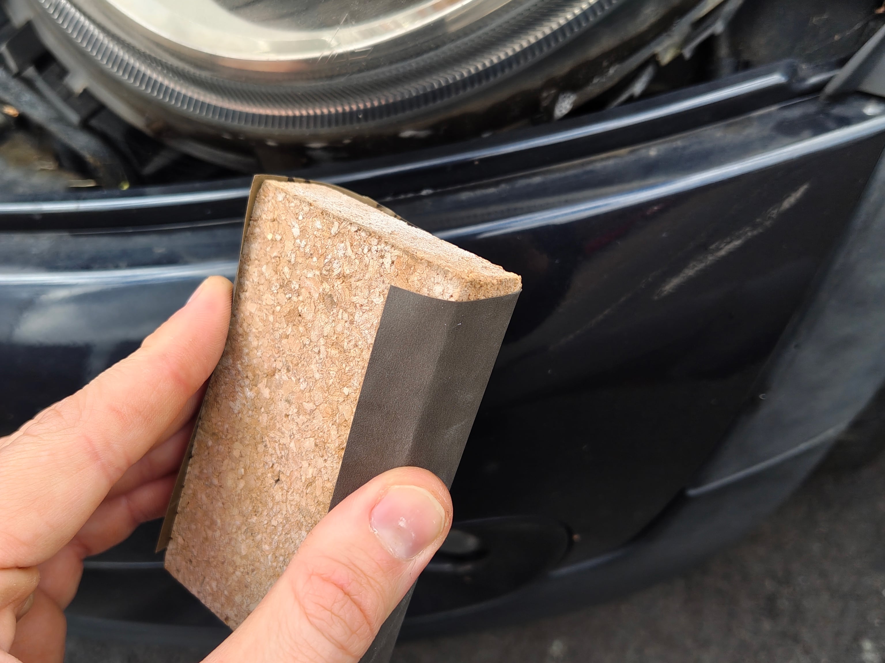 Step 1: 1200 grit sandpaper wrapped around a sanding block