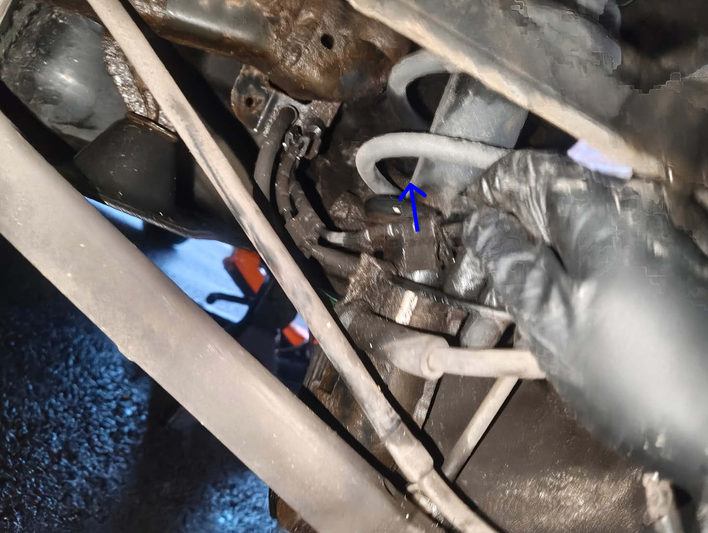 Detaching rear brake sensor rubber clip