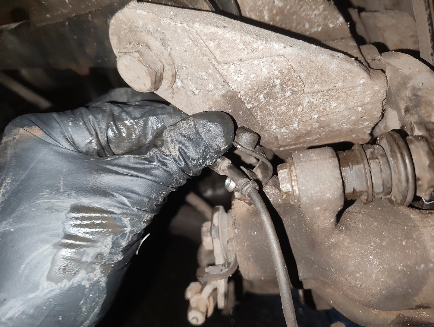 Undone rear brake bleed needle sensor cable fastener